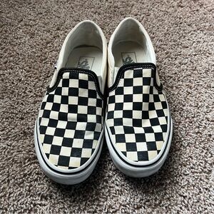 Checkered Vans slip ons